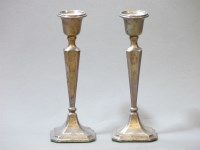 Lot 189 - A pair of silver candlesticks