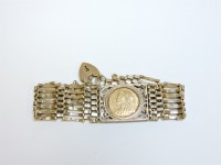 Lot 20 - A 9ct gold seven row gate bracelet