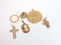 Lot 25 - Four gold charms
