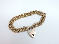 Lot 33 - A hollow gold curb bracelet