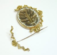 Lot 41 - A Victorian memorial gold swivel brooch