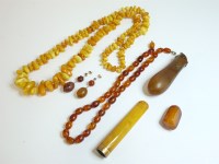 Lot 93 - A graduated egg yolk amber free form bead necklace