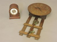 Lot 449 - An Arts and Crafts style wall clock