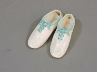 Lot 112 - A pair of W H Goss china shoes
