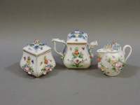 Lot 181 - A Dresden miniature teapot and cover