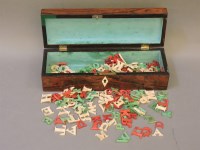 Lot 135 - A large quantity of Victorian coloured ivory alphabetical letters