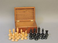 Lot 149 - A Staunton pattern boxwood and ebony chess set