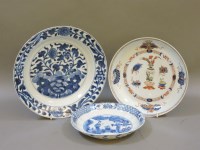 Lot 219 - Three Chinese Kangxi plates: two blue and white