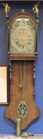 Lot 255 - A Dutch oak wall clock