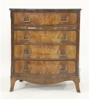 Lot 570 - A George III style mahogany serpentine chest of four long drawers and a brushing slide