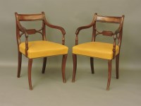 Lot 632 - A pair of Regency mahogany bar back elbow chairs