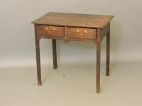 Lot 696 - An 18th century oak lowboy