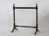 Lot 634 - A 19th century mahogany carpet stand