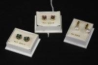 Lot 16 - A pair of 9ct gold diamond and emerald cluster earrings