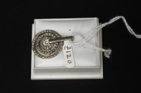 Lot 21 - A 9ct white gold diamond set hoop pendant