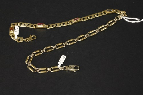 Lot 30 - A 9ct yellow and white gold chain link bracelet