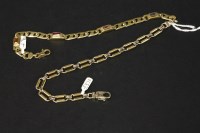 Lot 30 - A 9ct yellow and white gold chain link bracelet