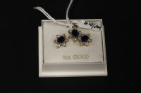 Lot 31 - A 9ct gold sapphire and diamond cluster pendant and earring suite