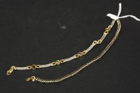 Lot 45 - A 9ct yellow and white gold cable link bracelet