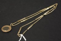 Lot 80 - A Georgian gold split pearl memorial locket and chain