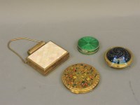 Lot 115 - Four ladies compacts