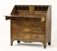 Lot 659 - A George III oak bureau