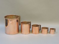 Lot 257 - A set of five copper measures