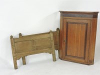 Lot 578 - A 19th century oak and mahogany cross banded wall mounted corner cupboard