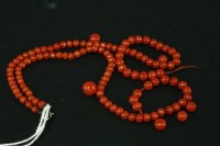 Lot 24 - A single row of graduated coral beads