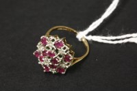 Lot 49 - A 9ct gold diamond and ruby cluster ring