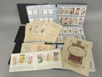 Lot 145 - Three albums of cigarette cards