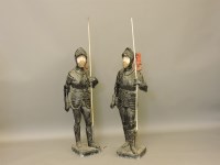 Lot 474 - A pair of painted wooden standing knights in armour