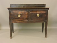 Lot 691 - An 18th century and later oak sideboard