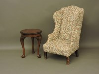 Lot 605 - A child's small upholstered wing bedroom chair