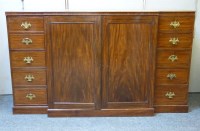 Lot 623 - A 19th century mahogany breakfront press cupboard