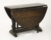 Lot 763 - A 17th century and later oak oval gateleg table