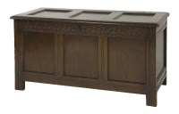 Lot 765 - An 18th century and later oak three-panel coffer