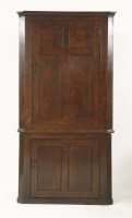 Lot 749 - A Georgian oak standing corner cupboard