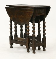 Lot 750 - An 18th century and later oak gateleg table