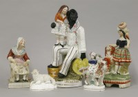 Lot 1060 - (WH) A Staffordshire figure of Uncle Tom