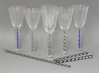 Lot 1128 - (WH) A matched set of nineteen modern coloured cotton twist stem wine glasses
