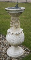 Lot 1667 - (WH) A reconstituted stone sundial