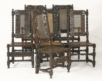 Lot 401 - A harlequin set of twelve carved walnut dining chairs