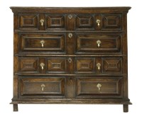 Lot 403 - An oak chest of four long drawers