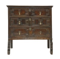 Lot 405 - An oak chest of three drawers