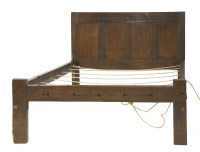 Lot 422 - An oak double bed