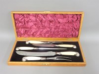 Lot 265 - A Victorian four piece silver mounted carving set