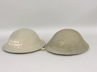Lot 269 - Two World War II British tin helmets
