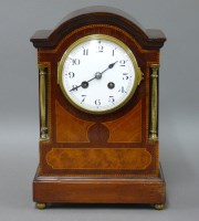 Lot 462 - An Edwardian mahogany inlaid mantel clock