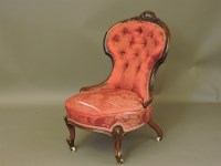 Lot 647 - A Victorian rosewood framed nursing chair